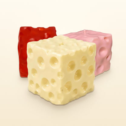 CHEDDI cheese squishy cubes in butter yellow, strawberry pink and cherry red