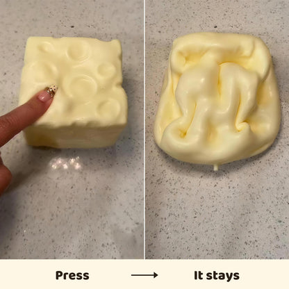 The same CHEDDI cube before and after squishing - it keeps the shape you press into it